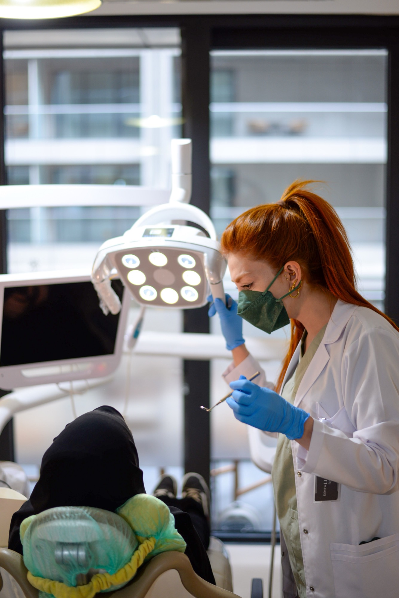 Dr. Julie Thomas examining a patient